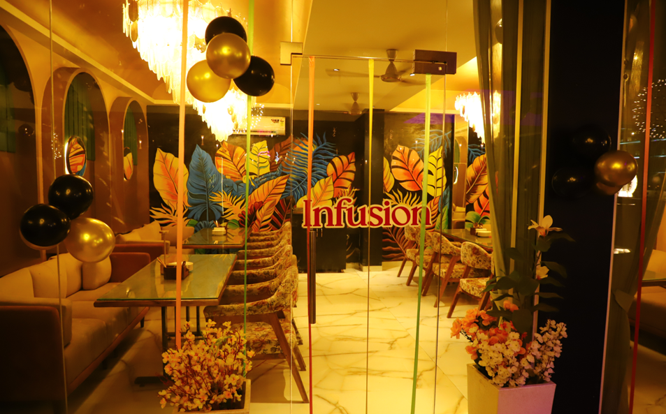 Bartender pouring drinks at Infusion Neo bar in Ganga Nagar Meerut